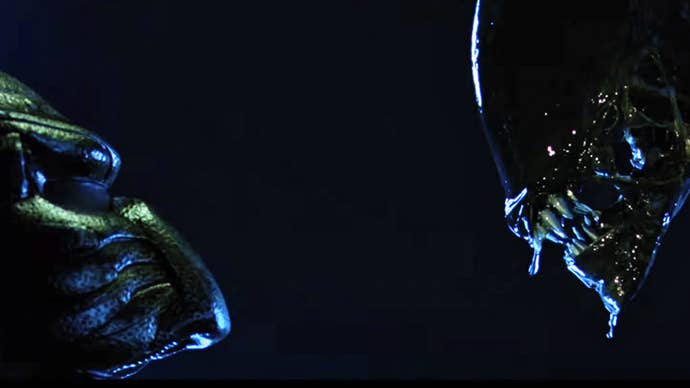 An Alien and a Predator stare at each other in the sci-fi action film Alien vs Predator.