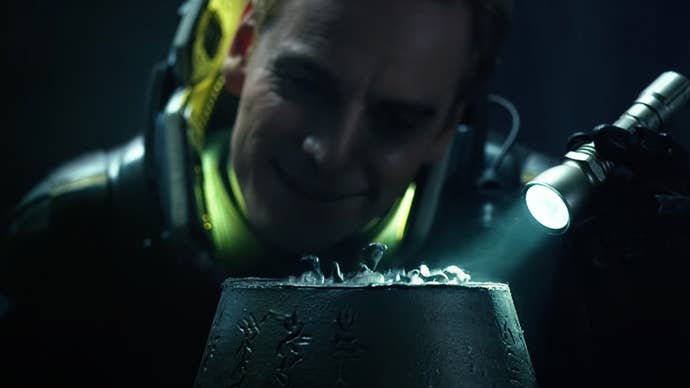 The android David examining something closely in the sci-fi horror film Prometheus.