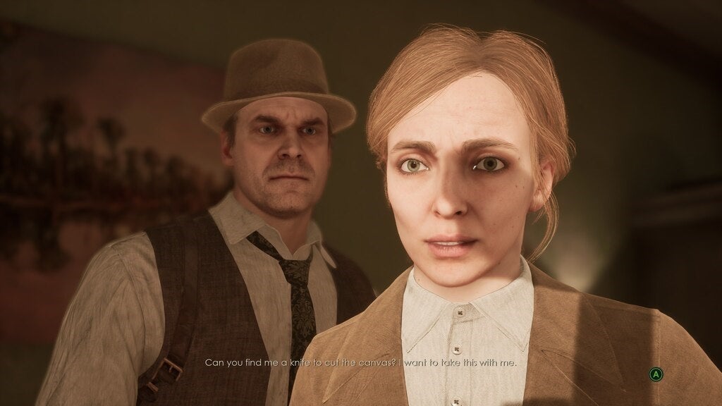 Alone in the Dark - Emily&rsquo;s gaze is lost in a painting as Edward looks confused and concerned at her