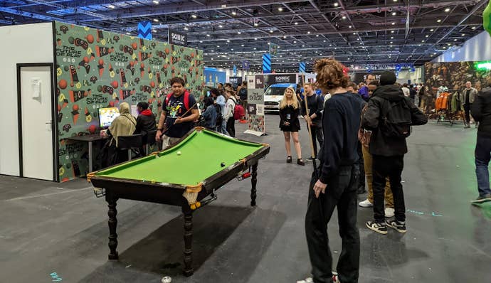 Home Turf by Ed Saperia next to the custom controller booth at EGX 2022.