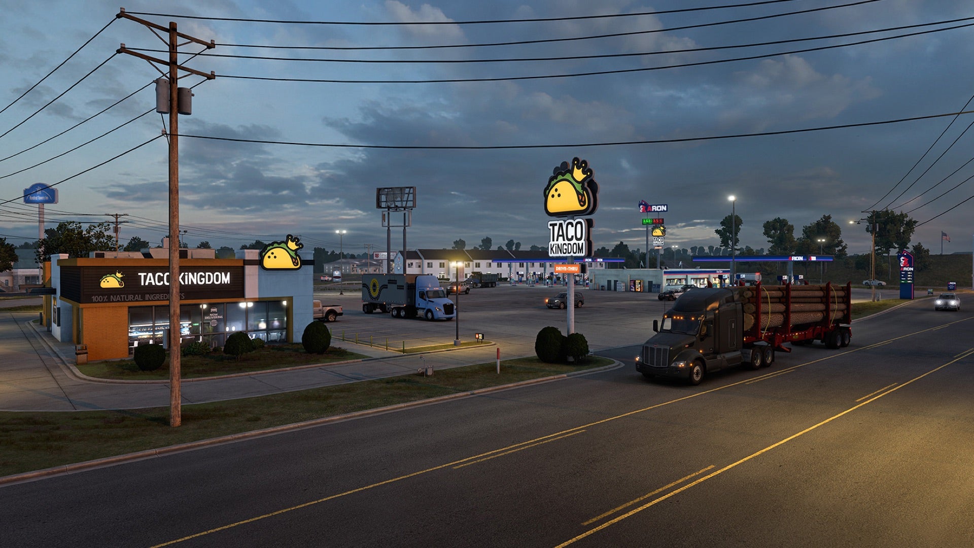A work-in-progress screenshot from American Truck Simulator&rsquo;s Arkansas expansion showing a truck pulling into a Taco Kingdom diner at dusk
