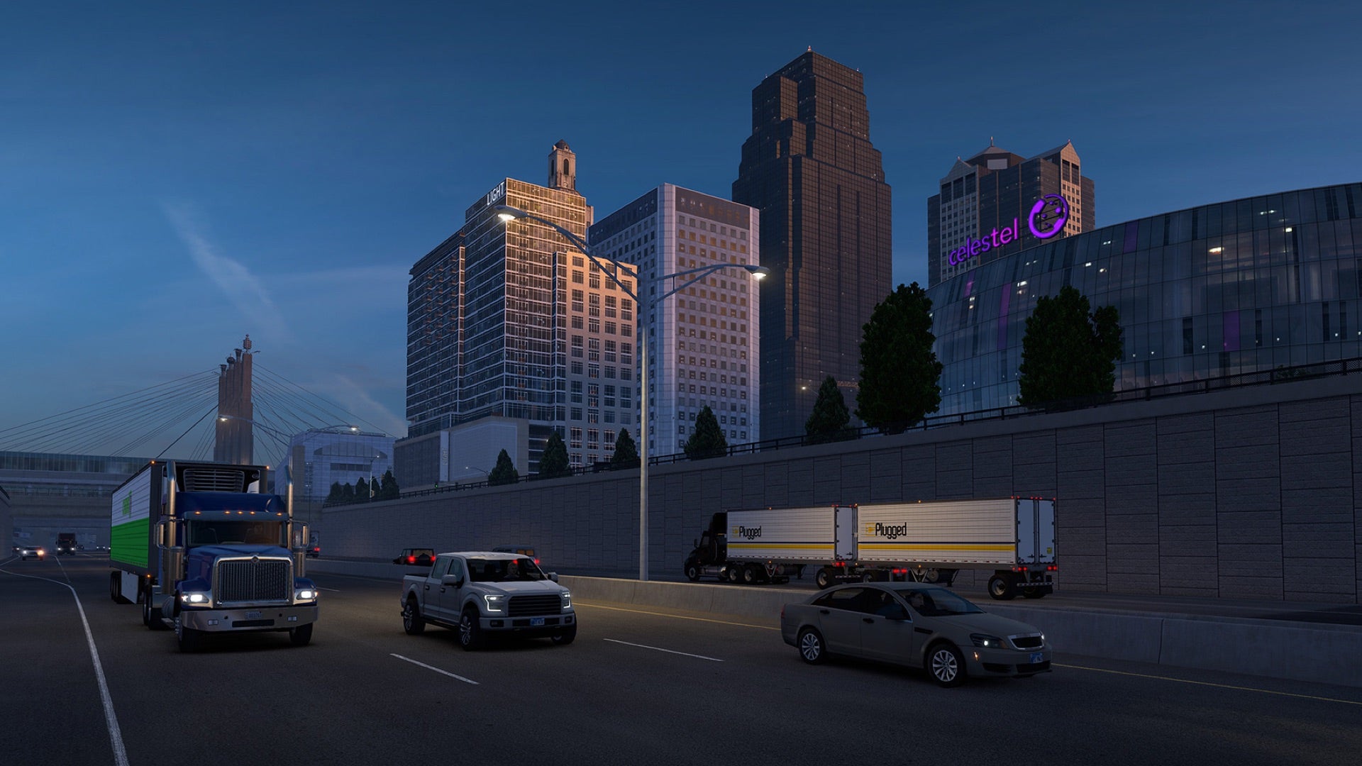 A work-in-progress screenshot of American Truck Simulator&rsquo;s Missouri expansion showing vehicles travelling along a highway at dusk as tall city buildings loom in the background.