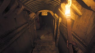 Walking down a hallway with an improvised torch in Amnesia: The Bunker