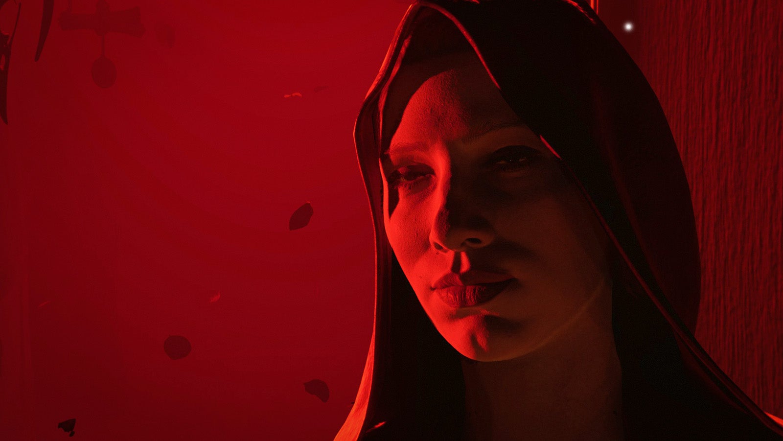 A hooded woman in a strong red light, looking forlorn