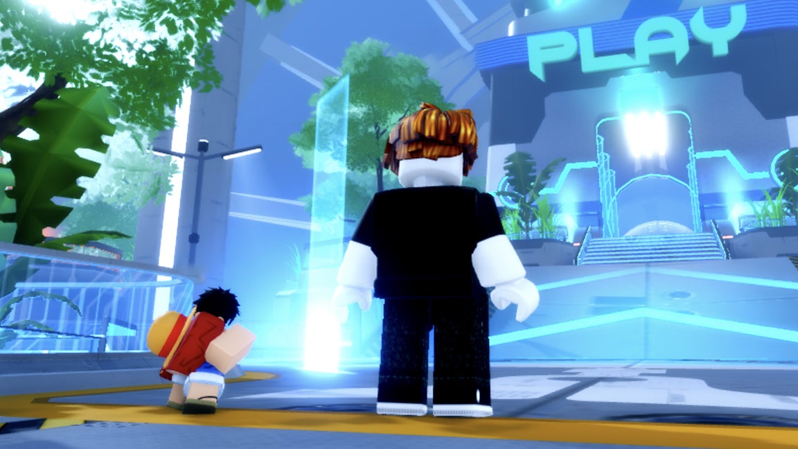 A Roblox character, standing next to a tiny One Piece-inspired character in the tower defense game Anime Rangers X. - 1