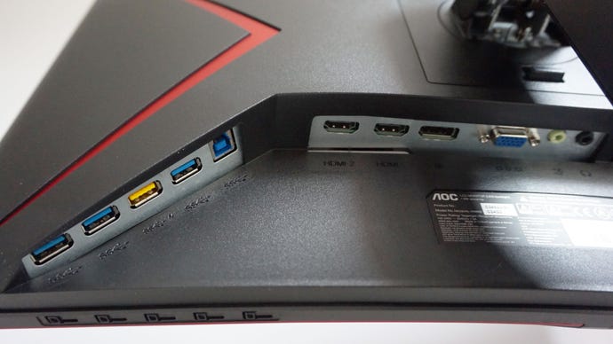 A photo of the AOC C24G2U gaming monitor’s display inputs and USB hub