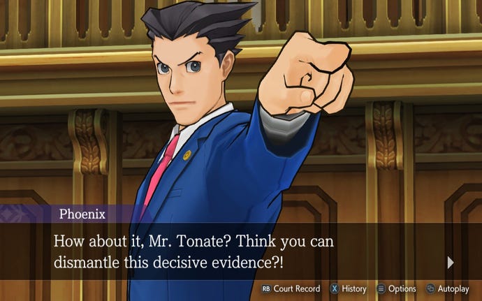 A man in a blue suit points to the camera in the Apollo Justice: Ace Attorney Trilogy