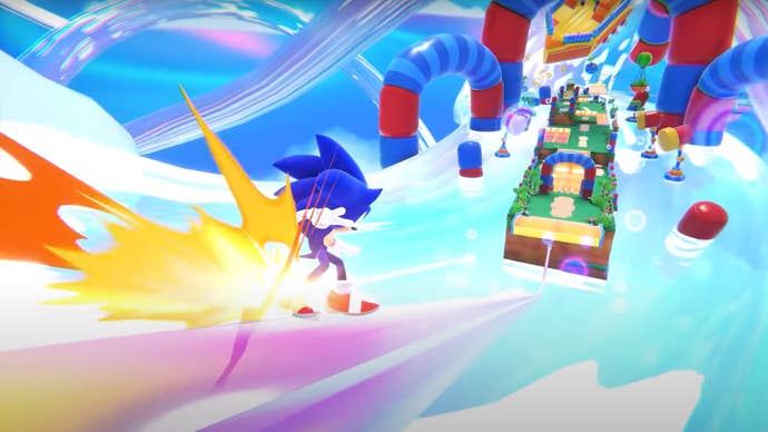 Sonic speeding through a colourful environment in the mobile game Sonic Dream Team.