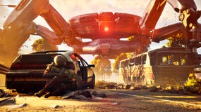 A player in Arc Raiders crouches down and hides behind a car in the foreground of an outdoor scene, while in the background a massive ARC Queen towers above the landscape.