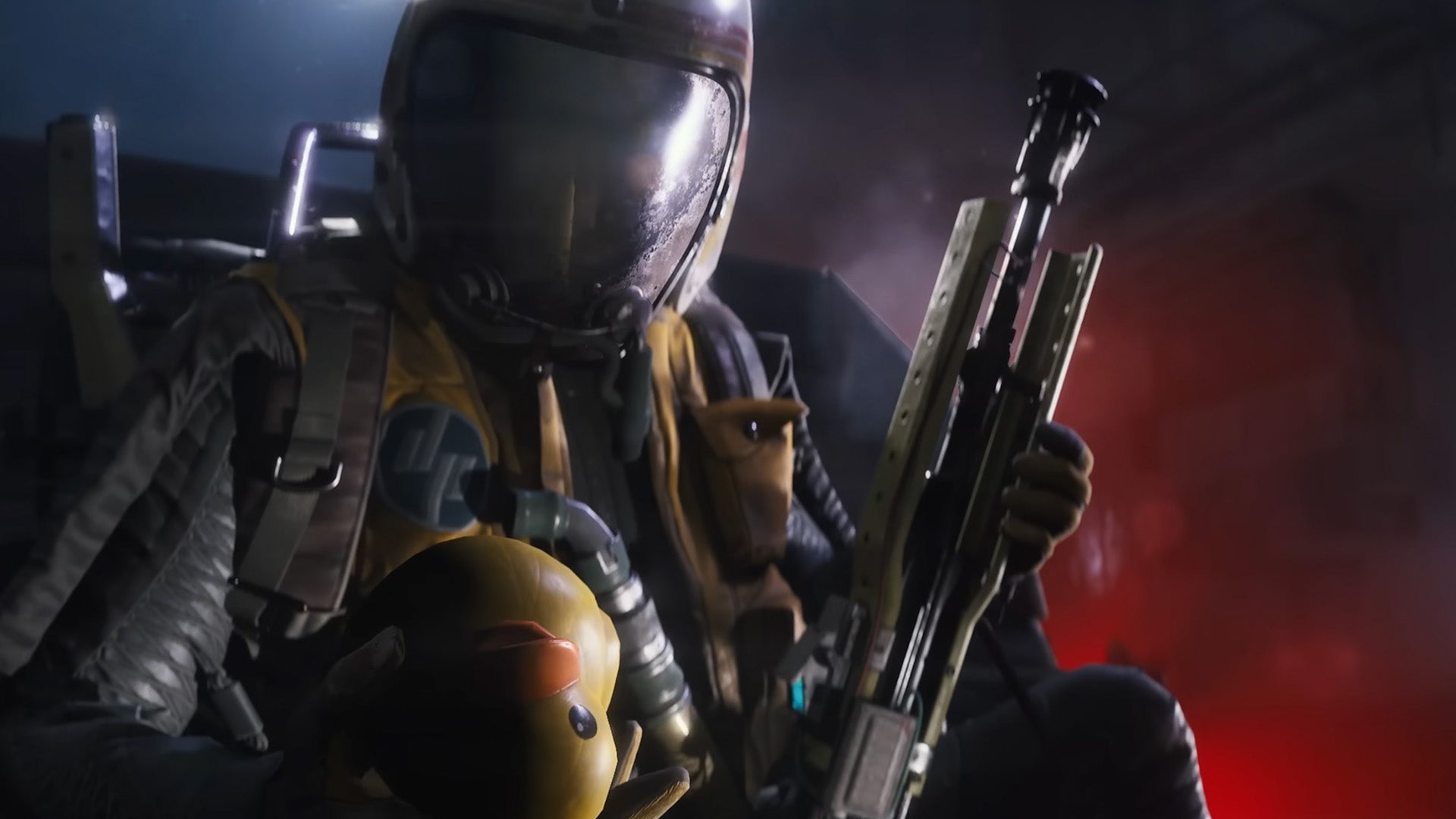 A person in put together tactical gear is holding a gun in one hand, a rubber duck in the other in Arc Raiders. - 1