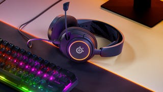 SteelSeries Arctis Nova 3 headset shown with other SteelSeries peripherals on a desk