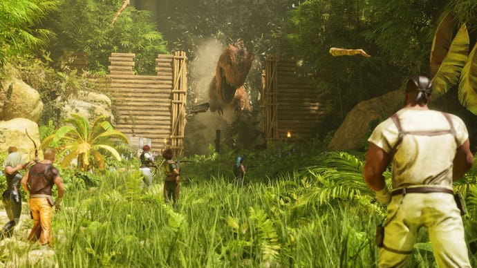 A dinosaur smashes a gate as characters watch on in Ark: Survival Ascended