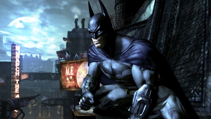 Batman crouches ominously on a rooftop in Batman: Arkham City - 1