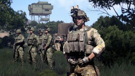 Soldiers standing in a line in forested countryside in military shooter Arma 3