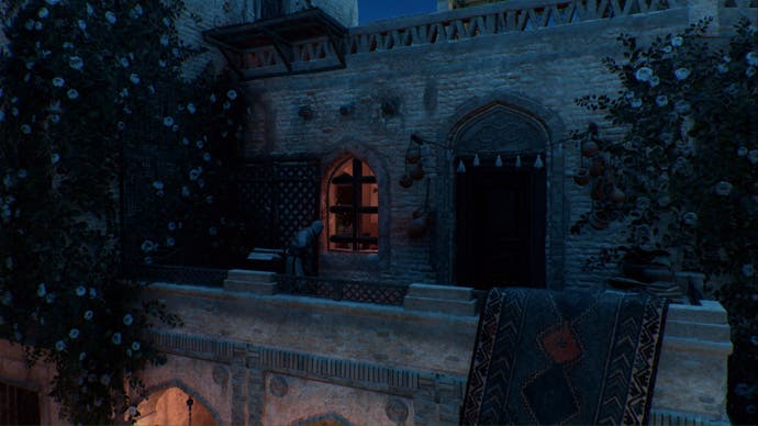 assassins creed mirage, Basim is standing on a stone balcony looking inside a building through a window.