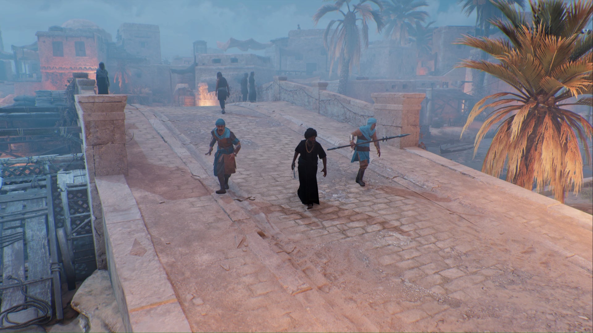 assassins creed mirage a tha&rsquo;abeen and two guards walk across a bridge in Anbar