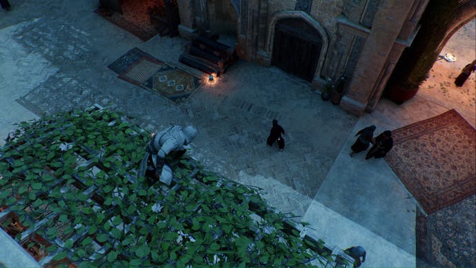 assassins creed mirage basim is on a vine covered roof looking down at a tha'abeen target in the round city