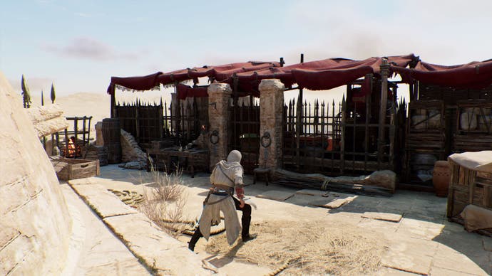 assassins creed mirage, Basim is running towards a wooden hut on the roof of khurasan gate guardhouse.