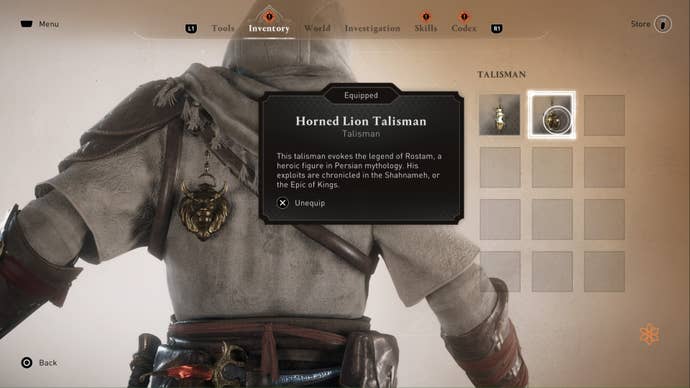 assassins creed mirage, the screen shows Basim’s talisman inventory and details for the horned lion talisman.