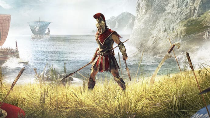 Alexios standing by a sea wearing Spartan armour, with battleships seen in the background in artwork for Assassin's Creed Odyssey.