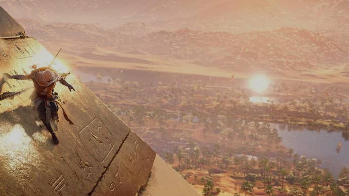 Bayek sliding down a pyramid in Egypt in Assassin's Creed Origins.