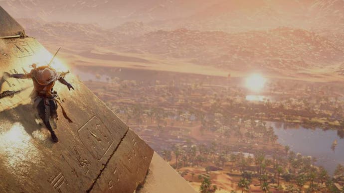 Bayek sliding down a pyramid in Egypt in Assassin's Creed Origins.