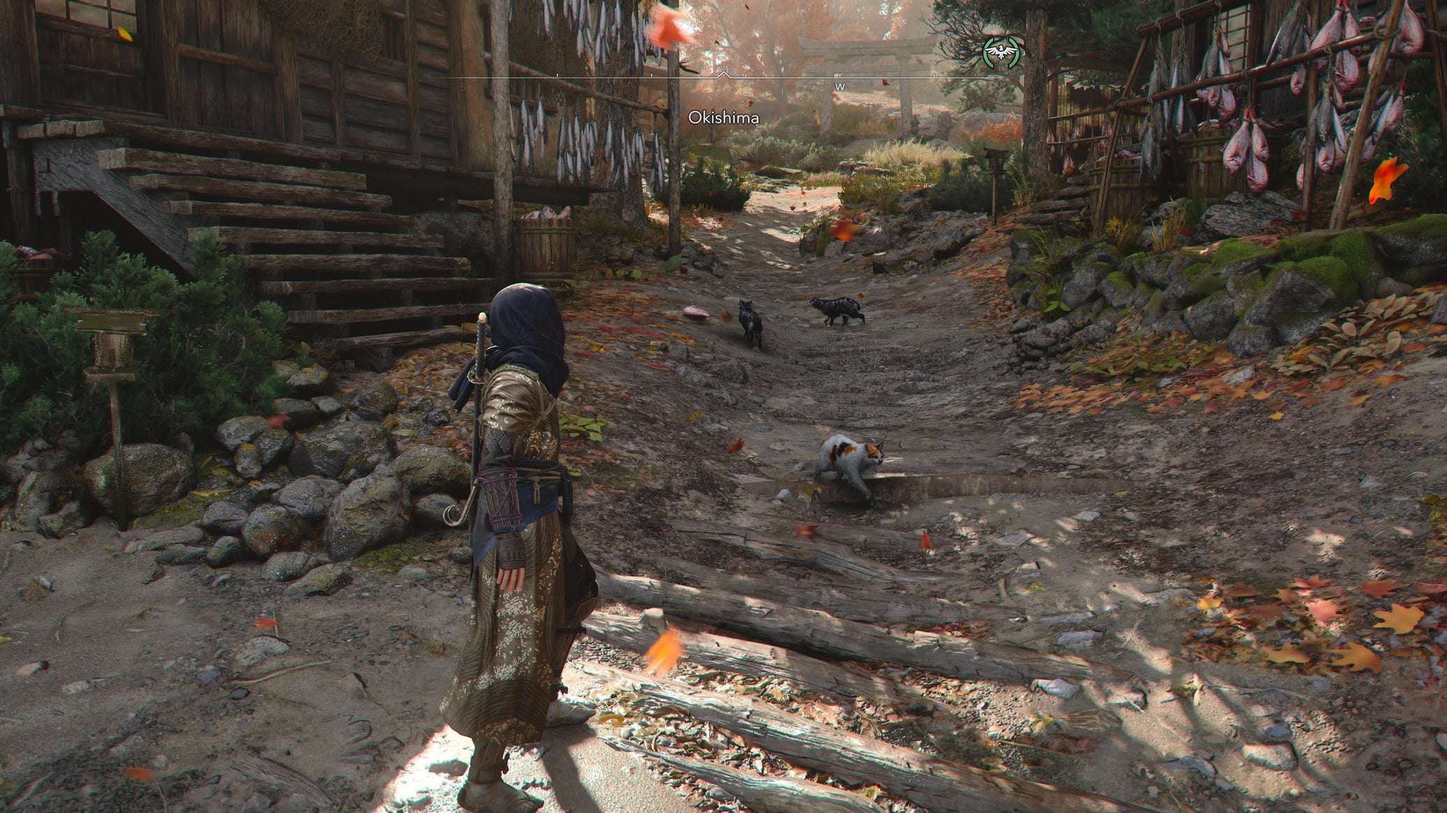 Naoe walking towards a group of cats on the island of Okishima in Assassin's Creed Shadows. - 1