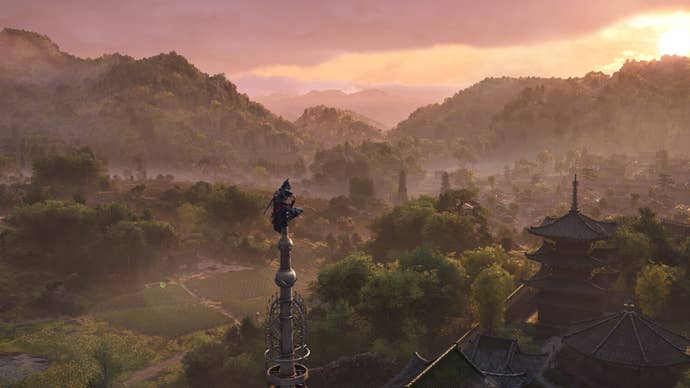 Naoe perched atop a tower in Assassin’s Creed Shadows.