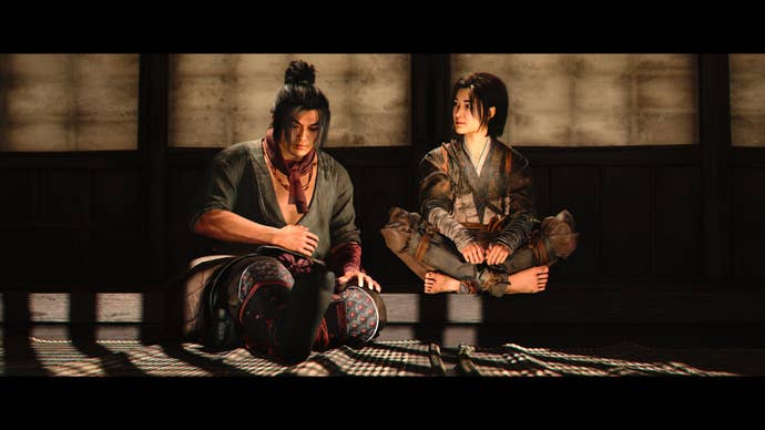 Naoe sits next to Gennojo, one of the the recruitable and romancable characters in Asssassin’s Creed Shadows.
