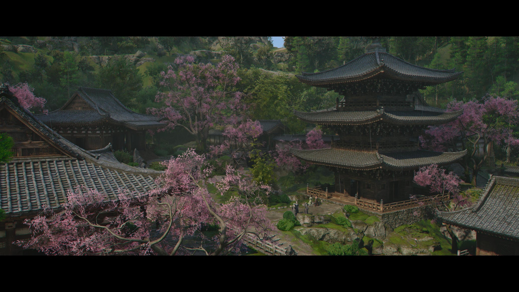 A view of blooming sakura and a traditional pagoda in Spring in Assassin's Creed Shadows. - 1