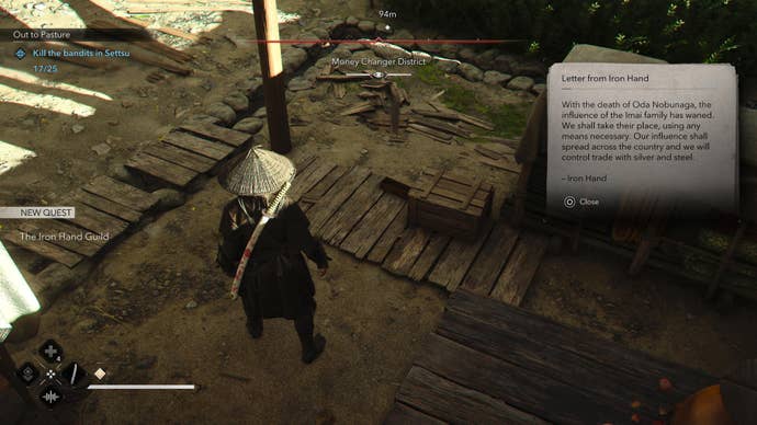 Naoe reading a letter from the Iron Hand Guild in Assassin’s Creed Shadows.