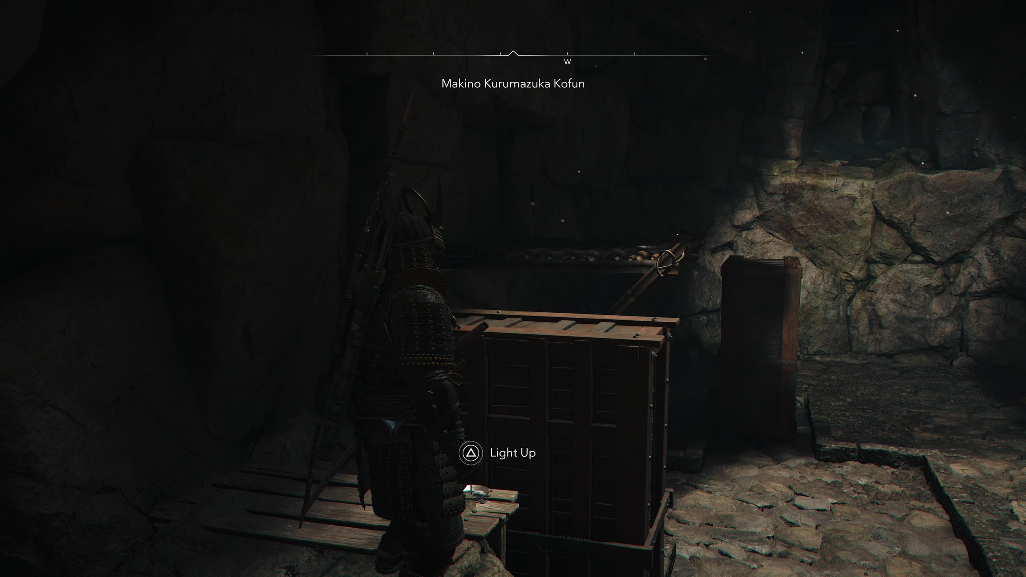 Yasuke using sliding boxes as a bridge inside Makino Kurumazuka Kofun in Assassin's Creed Shadows. - 5