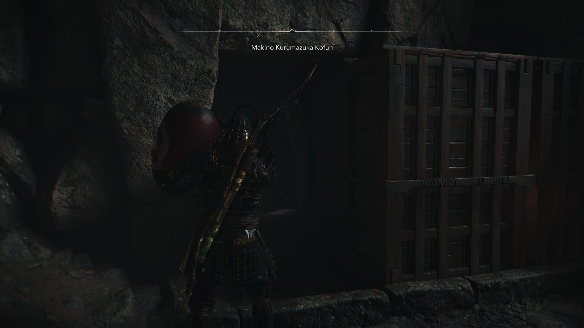 Yasuke carrying an exploding pot past a sliding box in Makino Kurumazuka Kofun in Assassin's Creed Shadows. - 6