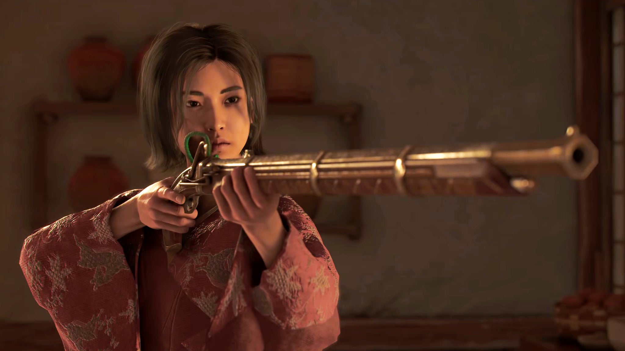 Naoe in Assassin's Creed Shadows aims a golden teppo at someone off-screen indoors. - 4