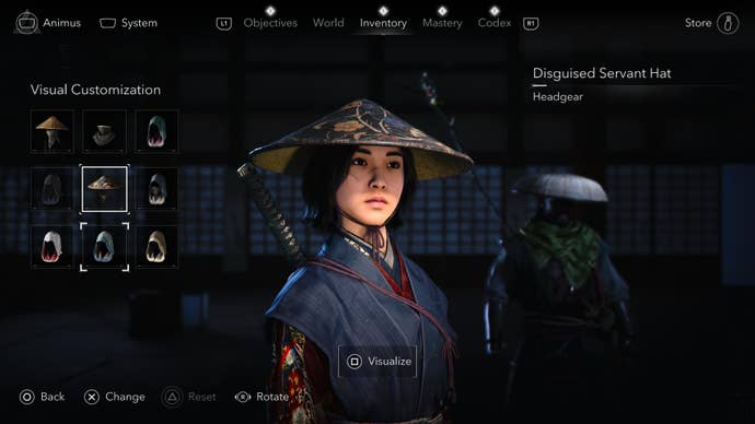 A close-up of Naoe in the Assassin’s Creed Shadows menu with visual customizing of her headgear to a conical hat.