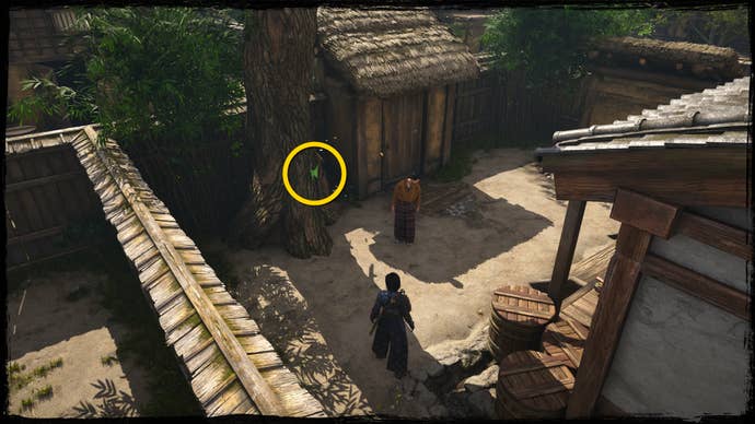A close-up of a tree in Osaka in Assassin’s Creed Shadows, with a yellow circle highlighting the location of a green Origami Butterfly.