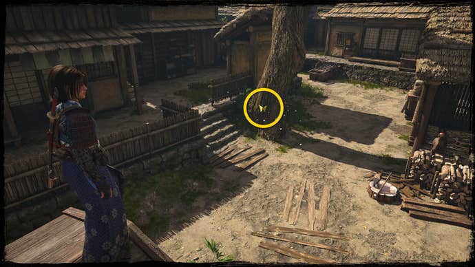 A close-up of a tree in Osaka in Assassin’s Creed Shadows, with a yellow circle highlighting the location of a yellow Origami Butterfly.