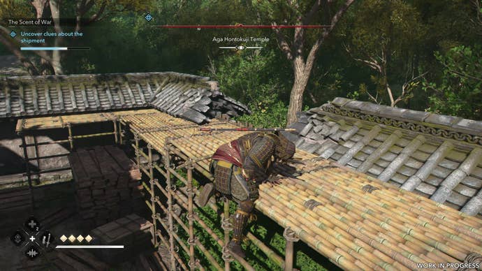 Yasuke hauls himself up over the edge of some bamboo scaffolding in Assassin’s Creed Shadows.