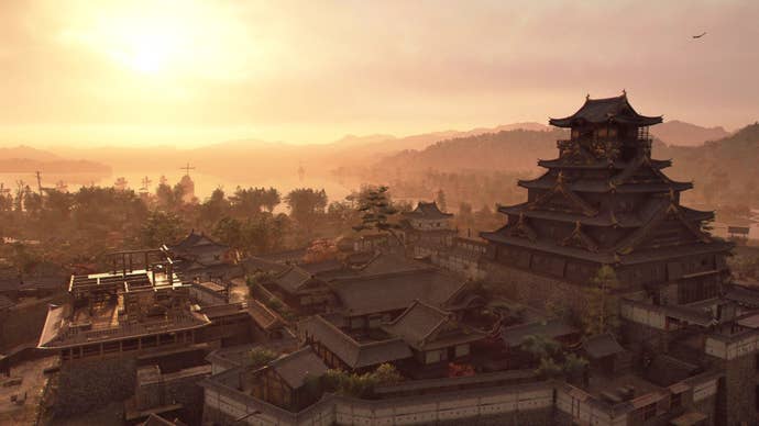 The view of a castle at sunset.