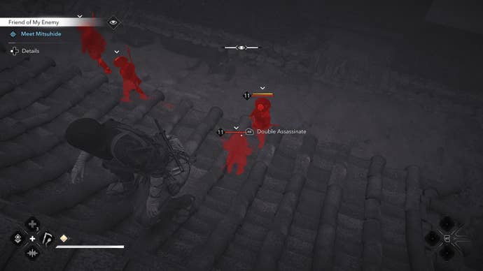 Naoe looks down on enemies using eagle vision, showing them glowing red against a dark background.