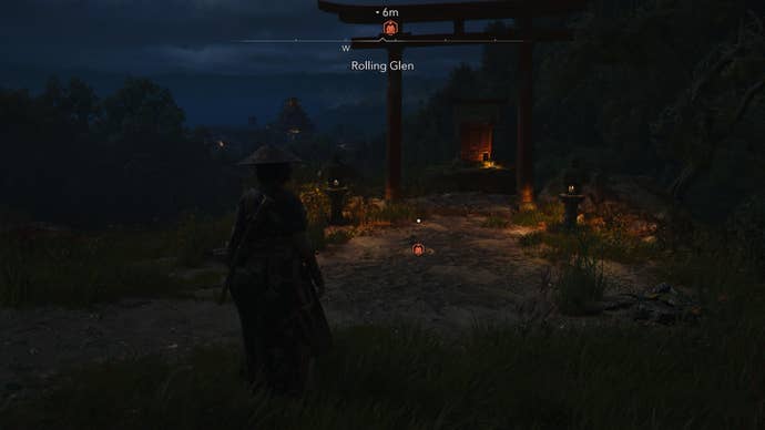 Standing in front of the Rolling Glen Kuji-kiri location in Assassin’s Creed shadows, which is marked by a torii.