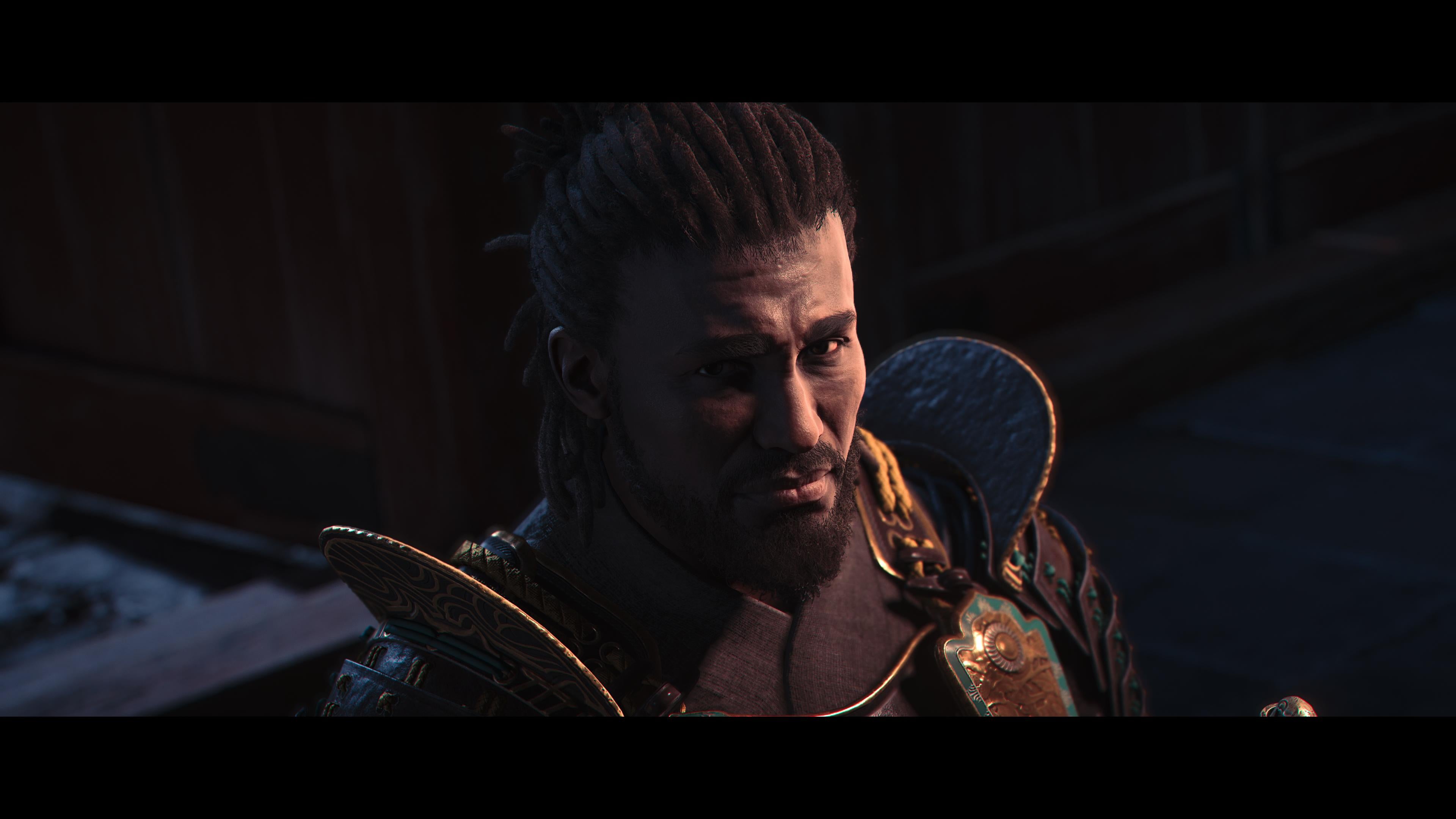 A close-up of Yasuke looking wistfully into the camera in Assassin's Creed Shadows.