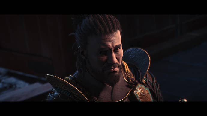 A close-up of Yasuke looking wistfully into the camera in Assassin’s Creed Shadows.