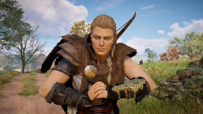 Eivor cracks her knuckles in an Assassin’s Creed Valhalla screenshot.