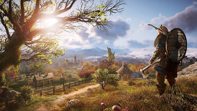 A viking looks across a huge, idyllic area of countryside in Assassin's Creed Valhalla.