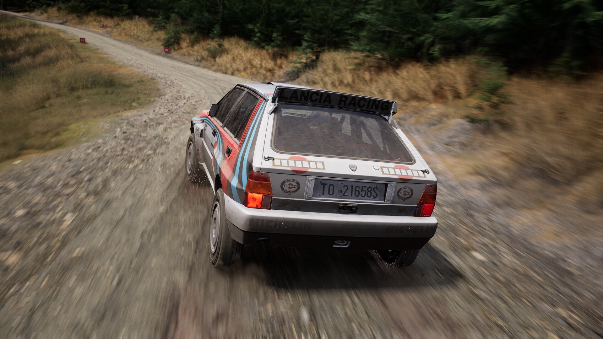 A Lancia Delta on gravel in Assetto Corsa Rally. - 3