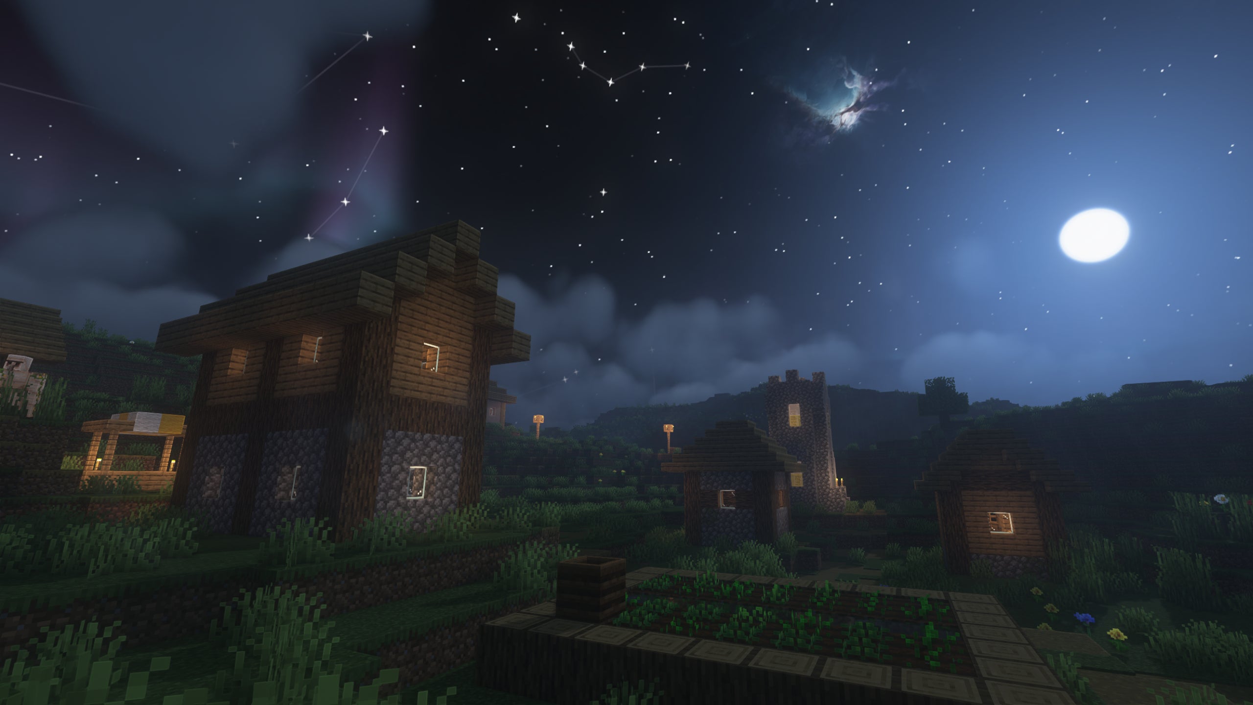 A Minecraft village at nighttime showcasing AstraLex shaders.