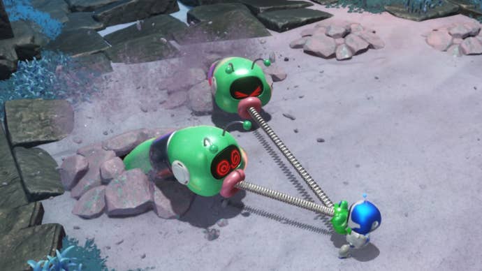 astro bot punching two wormys with twin frog ability