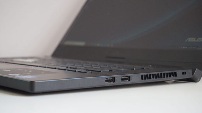 A photo of the Asus TUF Dash 15 gaming laptop’s USB ports on a white desk
