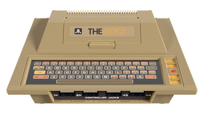 A promotional photo of THE400 Mini, a half-sized replica of the Atari 400.